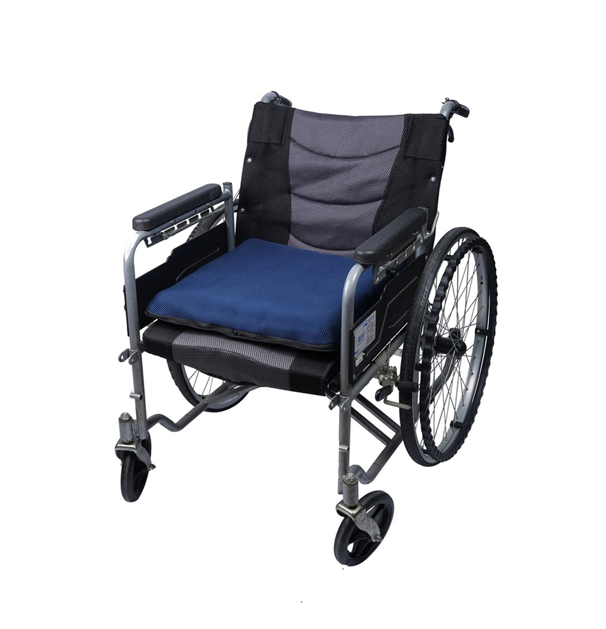 Blue AJ Air Cushion placed on a standard wheelchair seat, showing a breathable cushion surface for everyday wheelchair seating.