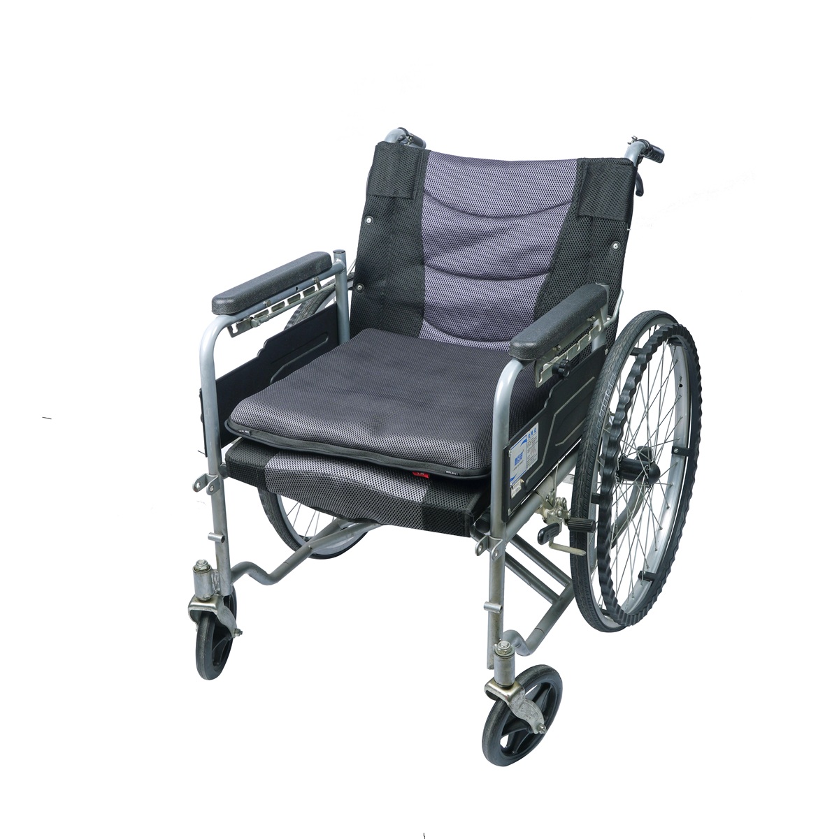 Gary AJ Air Cushion placed on a standard wheelchair seat, showing a breathable cushion surface for everyday wheelchair seating.