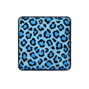 A top-down photograph on a white background showing a square AJ air cushion with a bright blue and black leopard print pattern and black piped edges.